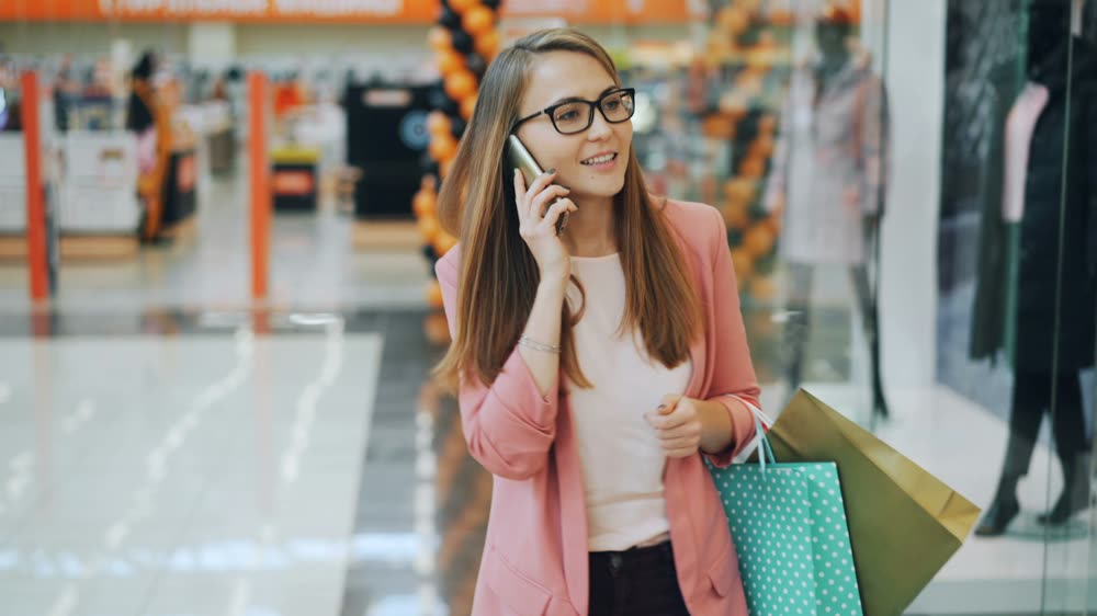 A customer on her phone